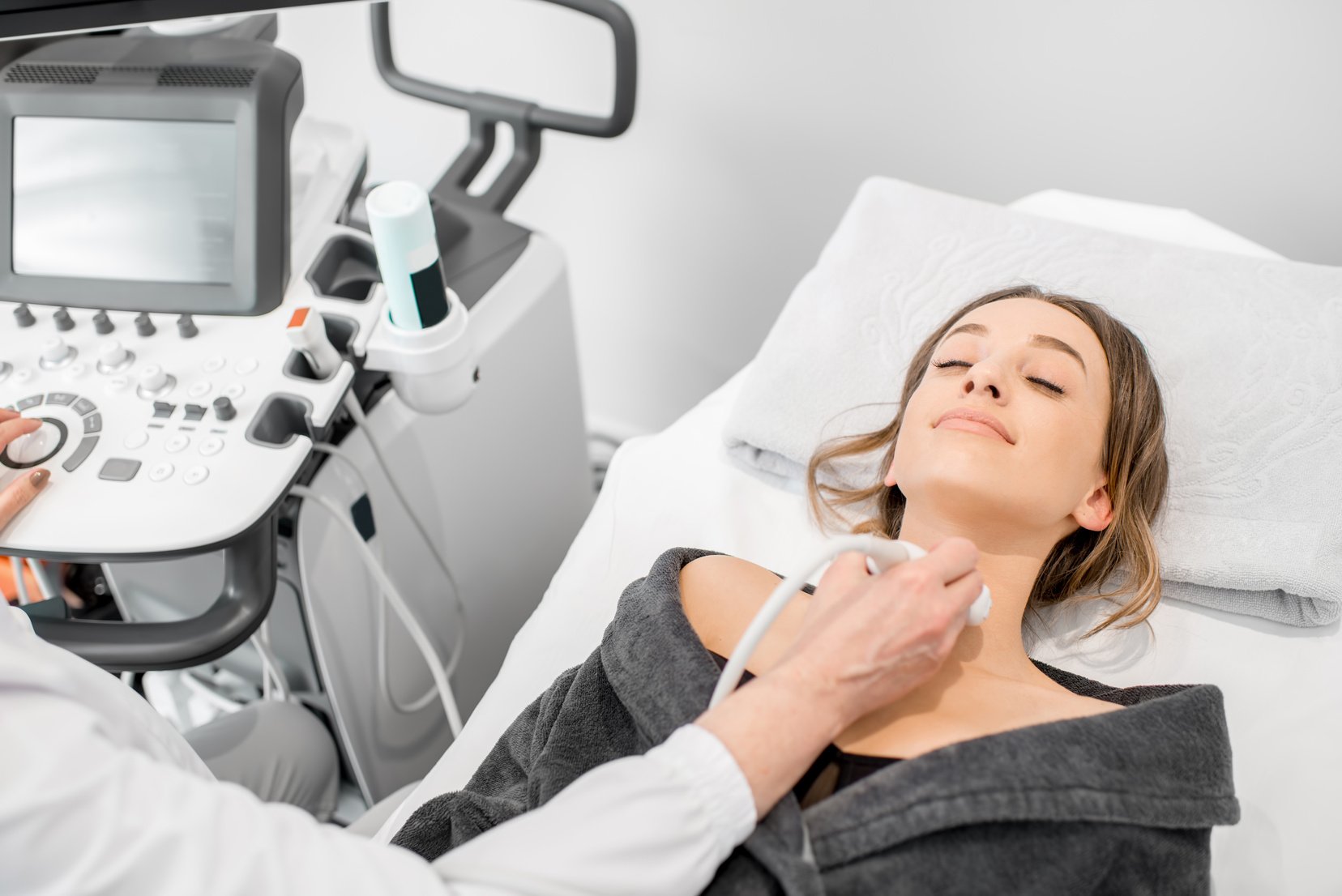 Woman during the Ultrasound Examination